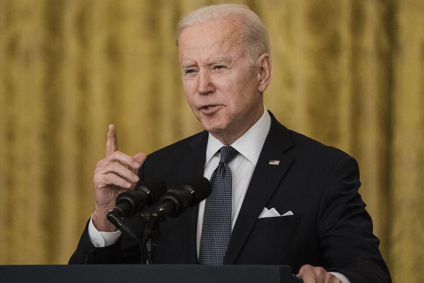 WASHINGTON, DC - FEBRUARY 15: President Joe Biden delivers remarks in the East Room of the White House, giving an update on the situation with Russia and Ukraine on Tuesday, Feb. 15, 2022 in Washington, DC. The President has said that the United States remains open to high-level diplomacy, continuing to believe that diplomacy and de-escalation are the best path forward. (Kent Nishimura / Los Angeles Times)