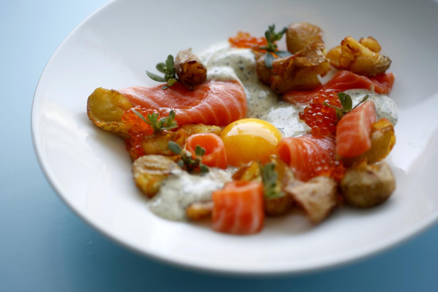 Try the crispy potatoes with smoked salmon, egg yolk, seaweed and roe at Alma at the Standard Hotel in West Hollywood.