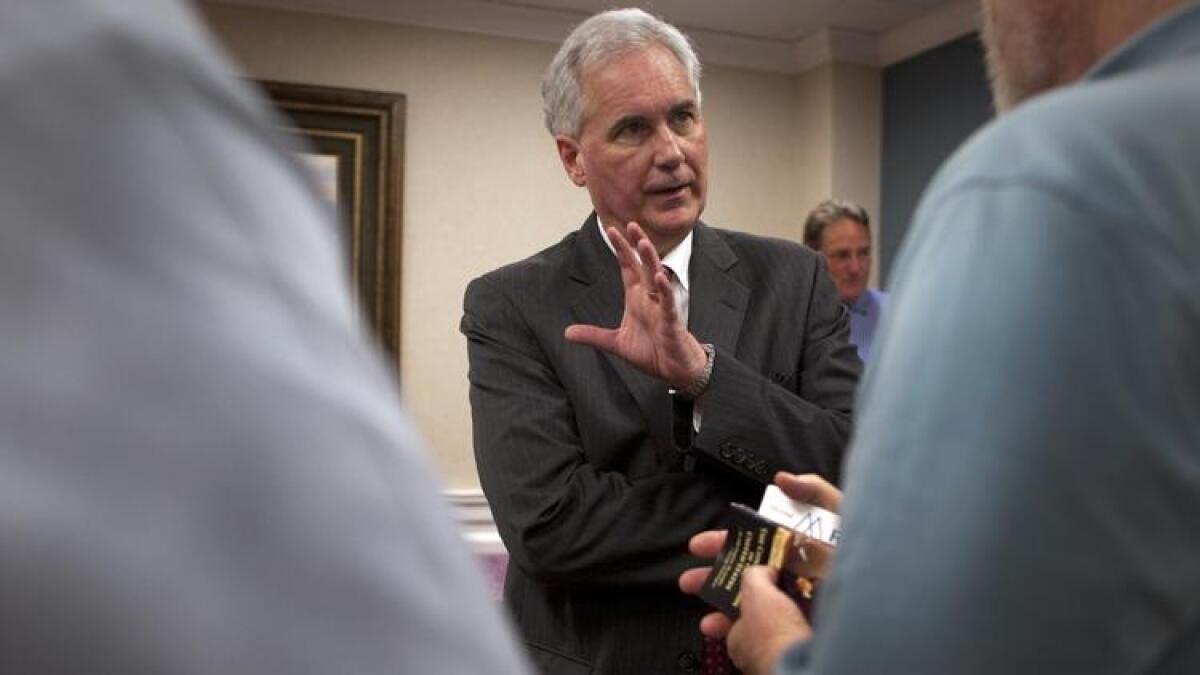 Rep. Tom McClintock (R-Elk Grove) talks with voters after speaking to a tea party group in 2014.