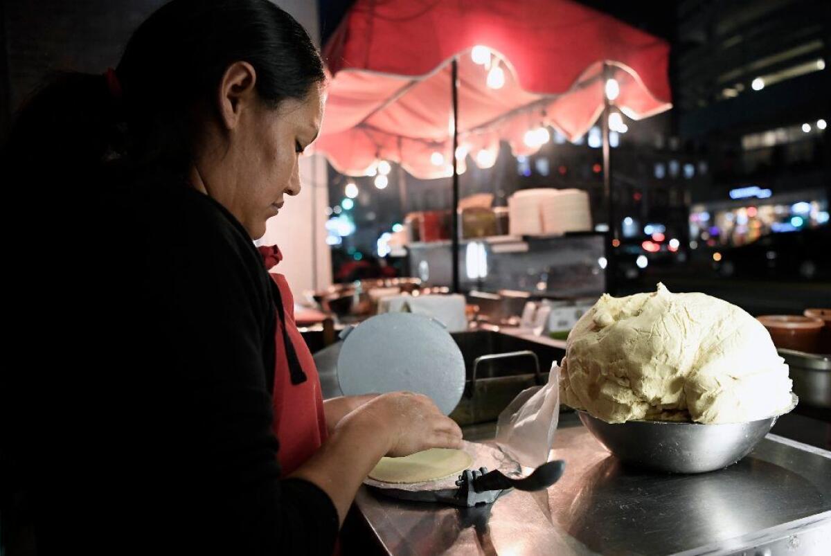 Oliva Garcia makes tortillas by hand at Tacos 1986.