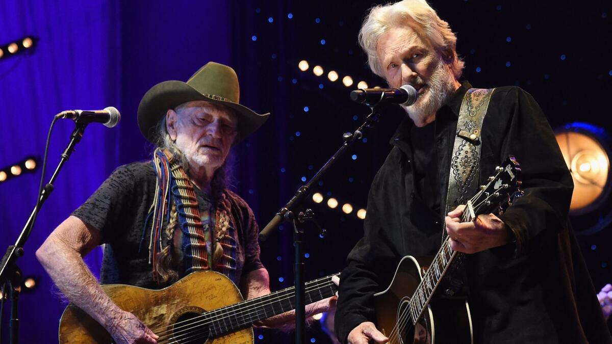 Willie Nelson, left, joins the celebration of "The Life and Songs of Kris Kristofferson" on CMT.
