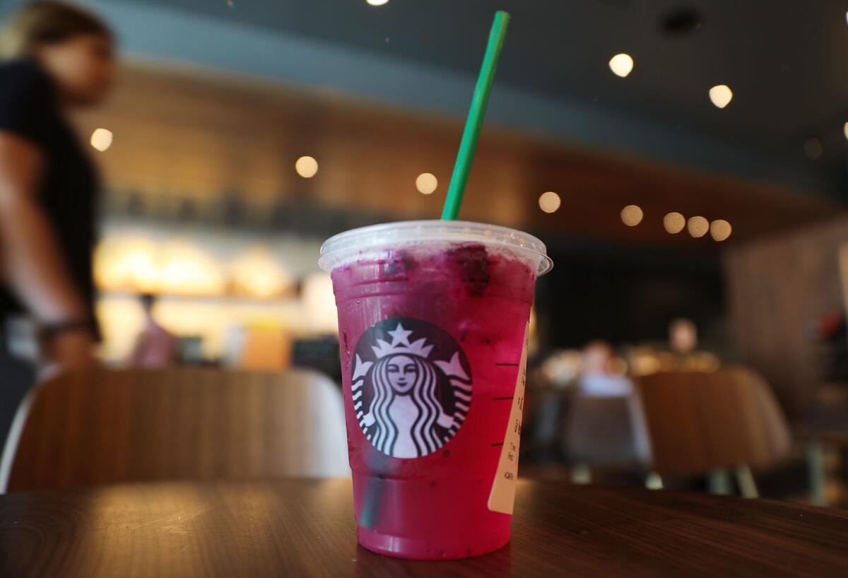 A plastic straw in a Starbucks drink