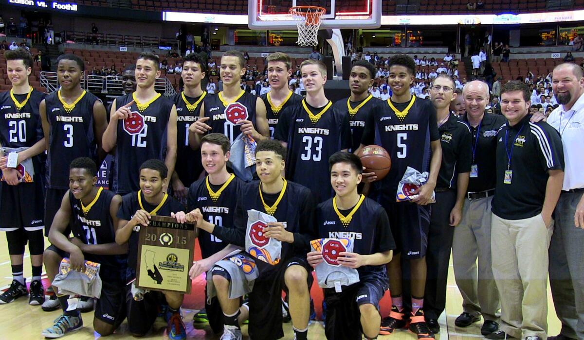 The Bishop Montgomery boys' basketball team poses for a photo after winning the Southern Section Open Division championship game on Saturday night.