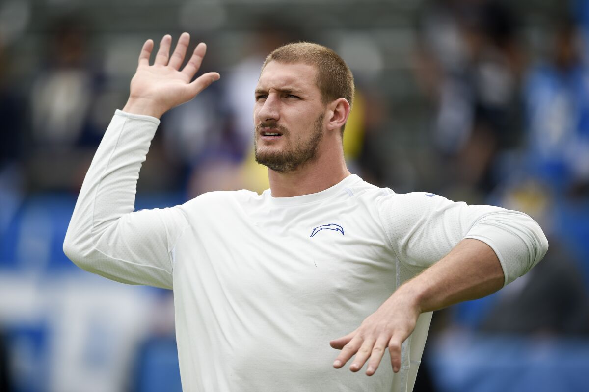 Los Angeles Chargers defensive end Joey Bosa warms up before an NFL football game.
