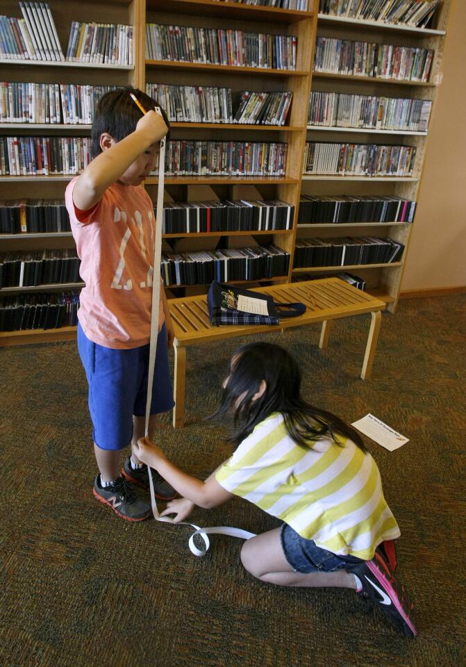 Photo Gallery: Scavenger hunt measures up at Montrose library