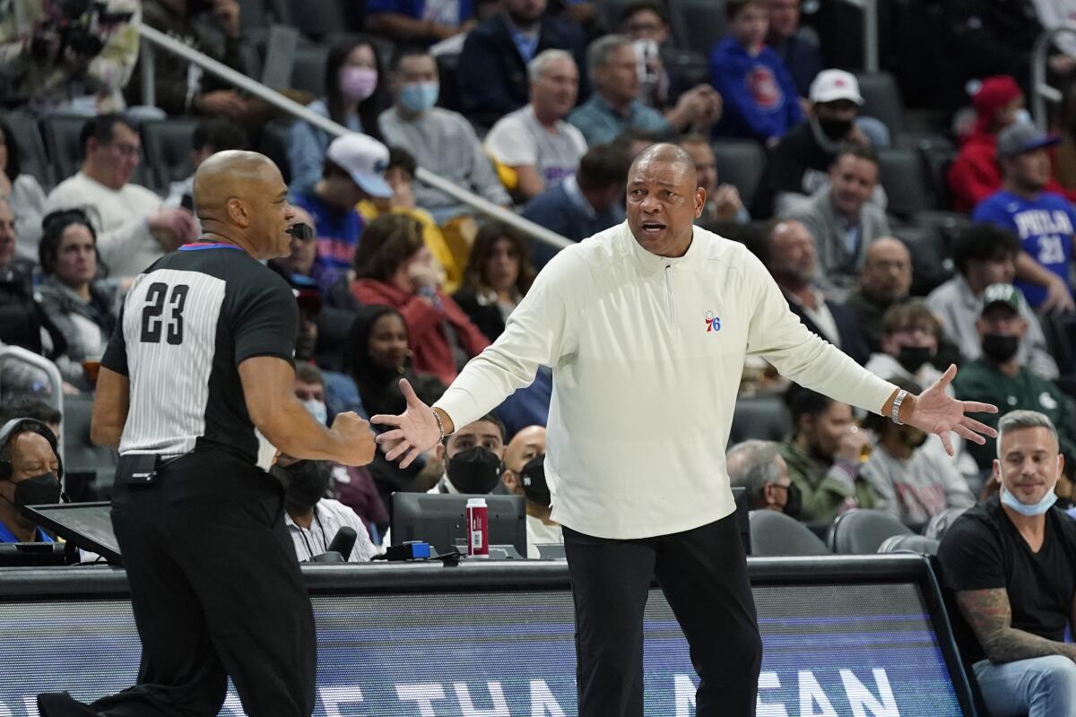 Philadelphia 76ers coach Doc Rivers looks toward a referee during a game against the Detroit Pistons on Nov. 4, 2021.