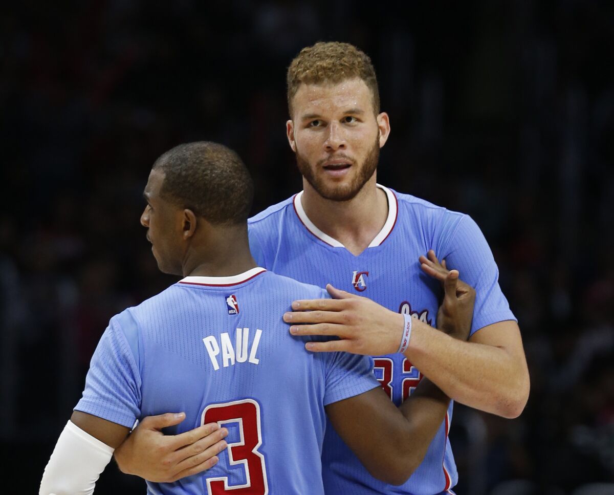 Blake Griffin, right, and Chris Paul congratulate each other during a game against New Orleans Pelicans on March 22, 2015.