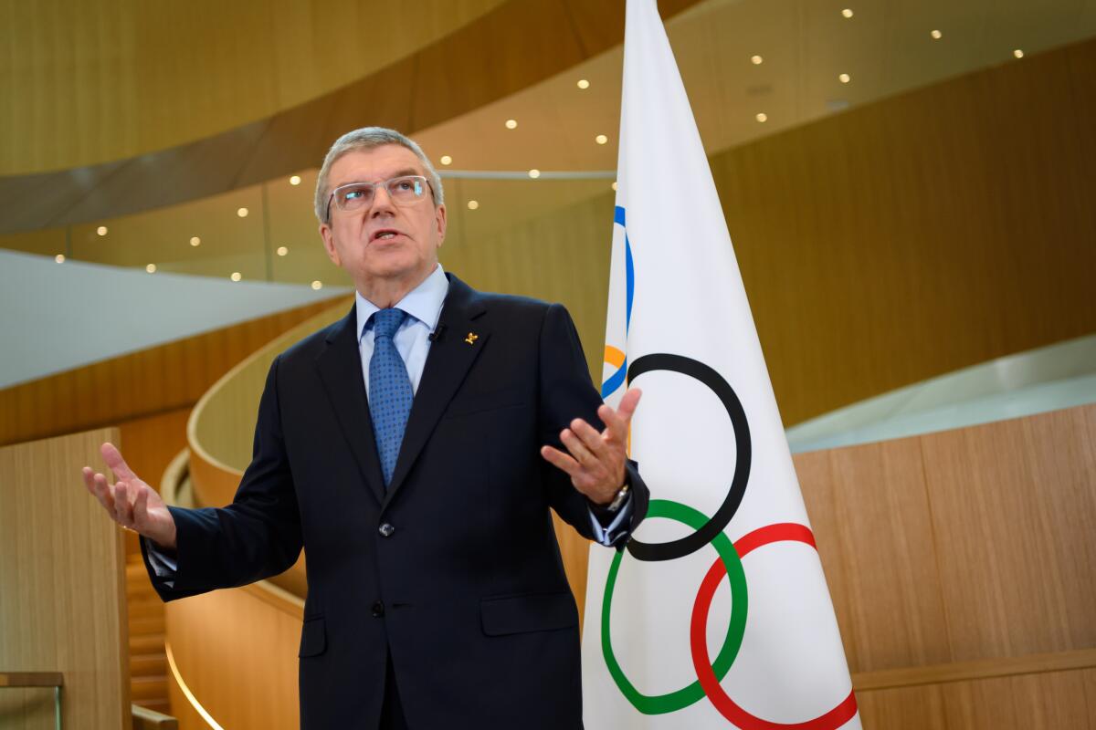 IOC President Thomas Bach speaks to reporters in March.