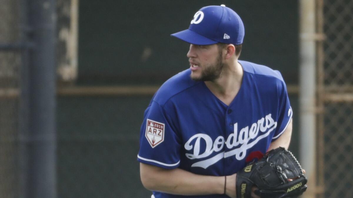 Dodgers pitcher Clayton Kershaw makes a play during a spring training in Arizona on Wednesday.