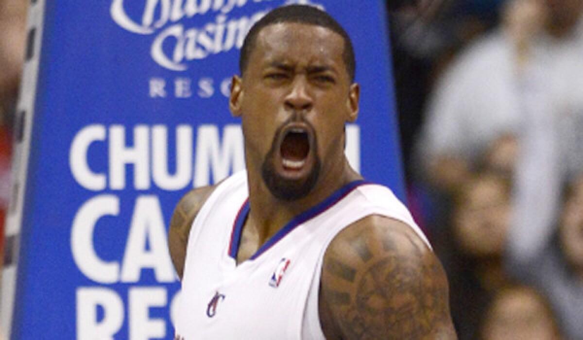 Clippers center DeAndre Jordan reacts after scoring two of his 15 points against Minnesota on Wednesday night.