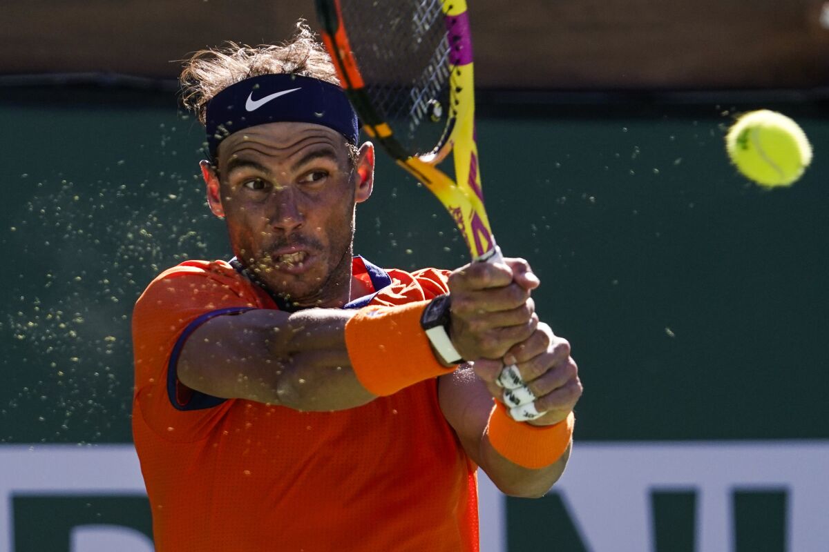 Rafael Nadal returns a shot during his match against Sebastian Korda on Saturday.