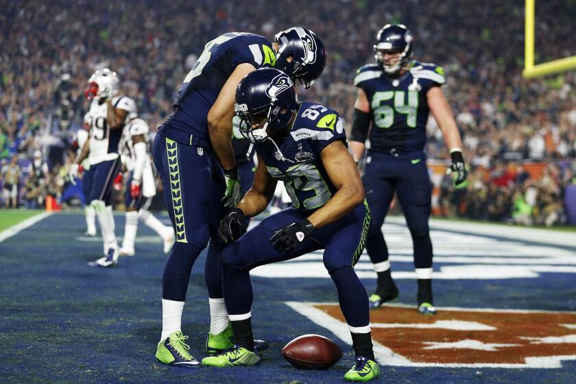 Seattle receiver Doug Baldwin celebrates after catching a touchdown pass against the New England Patriots during Super Bowl XLIX.