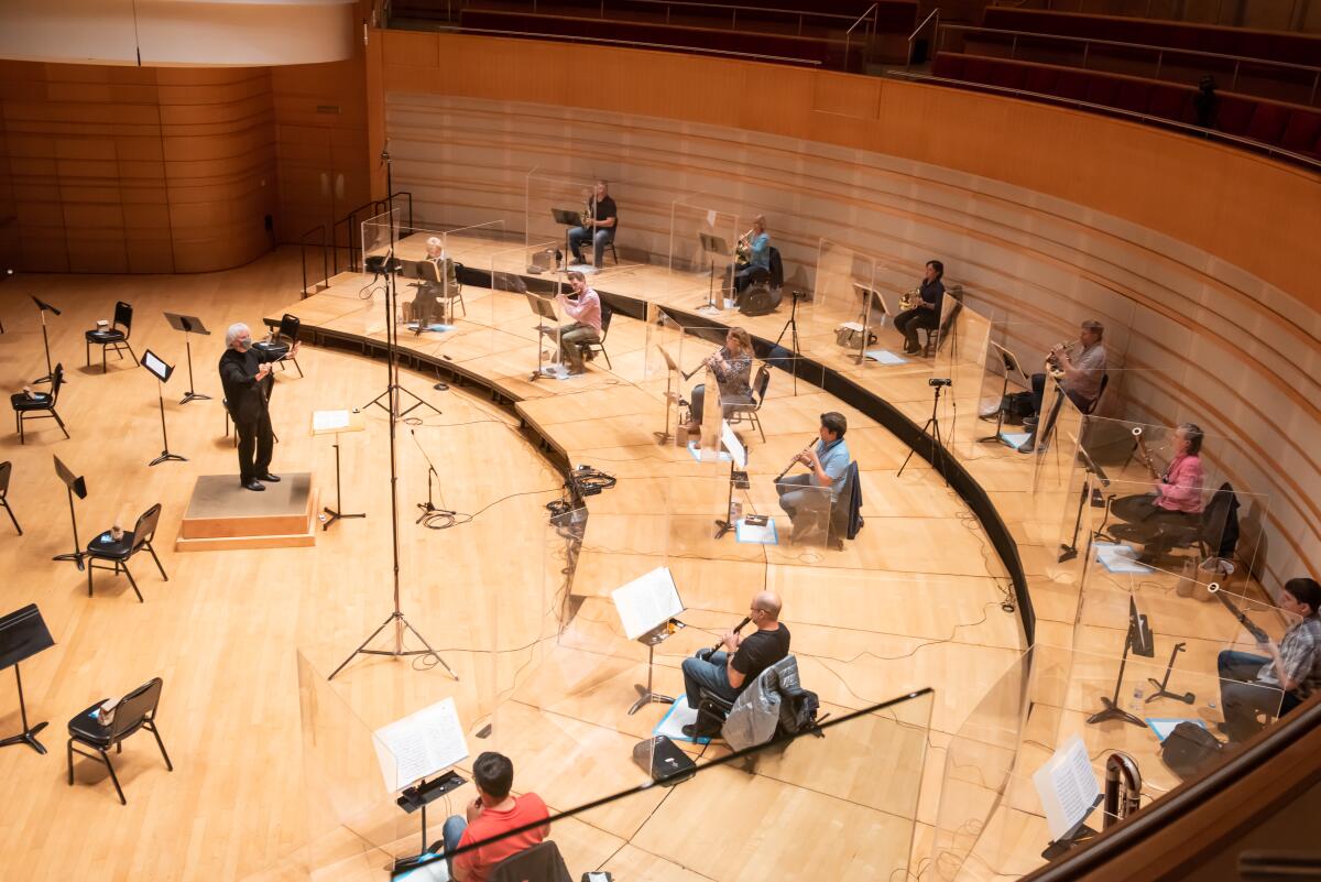 The Pacific Symphony's brass and wind section rehearse in preparation for the filming of Symphony Thursdays online series.