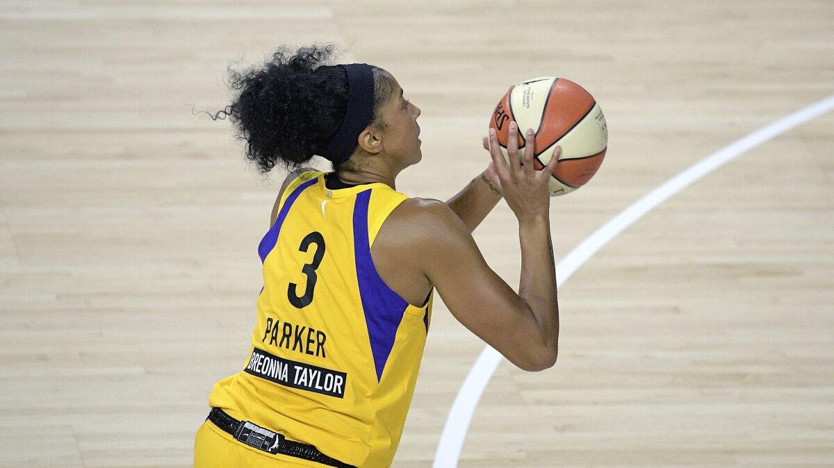 Sparks forward Candace Parker takes a shot.