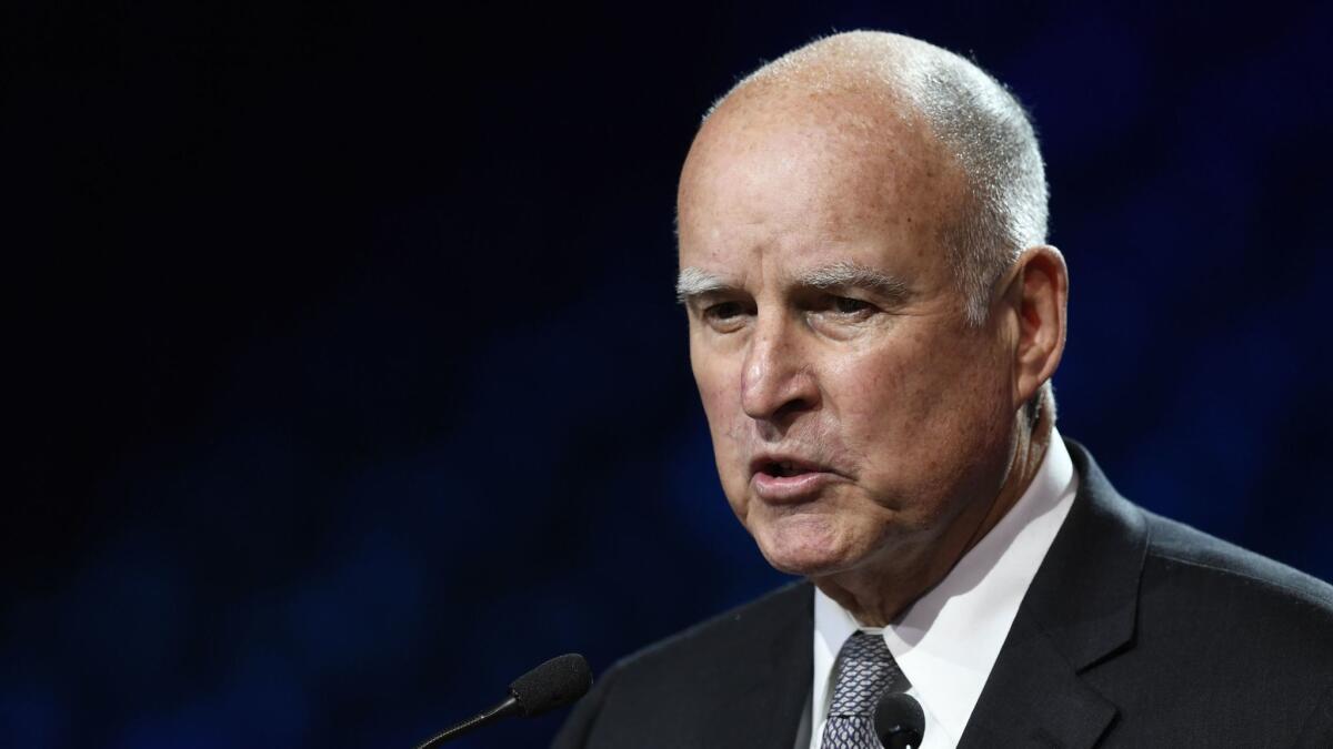 Gov. Jerry Brown speaks during a summit held mid-December in France.