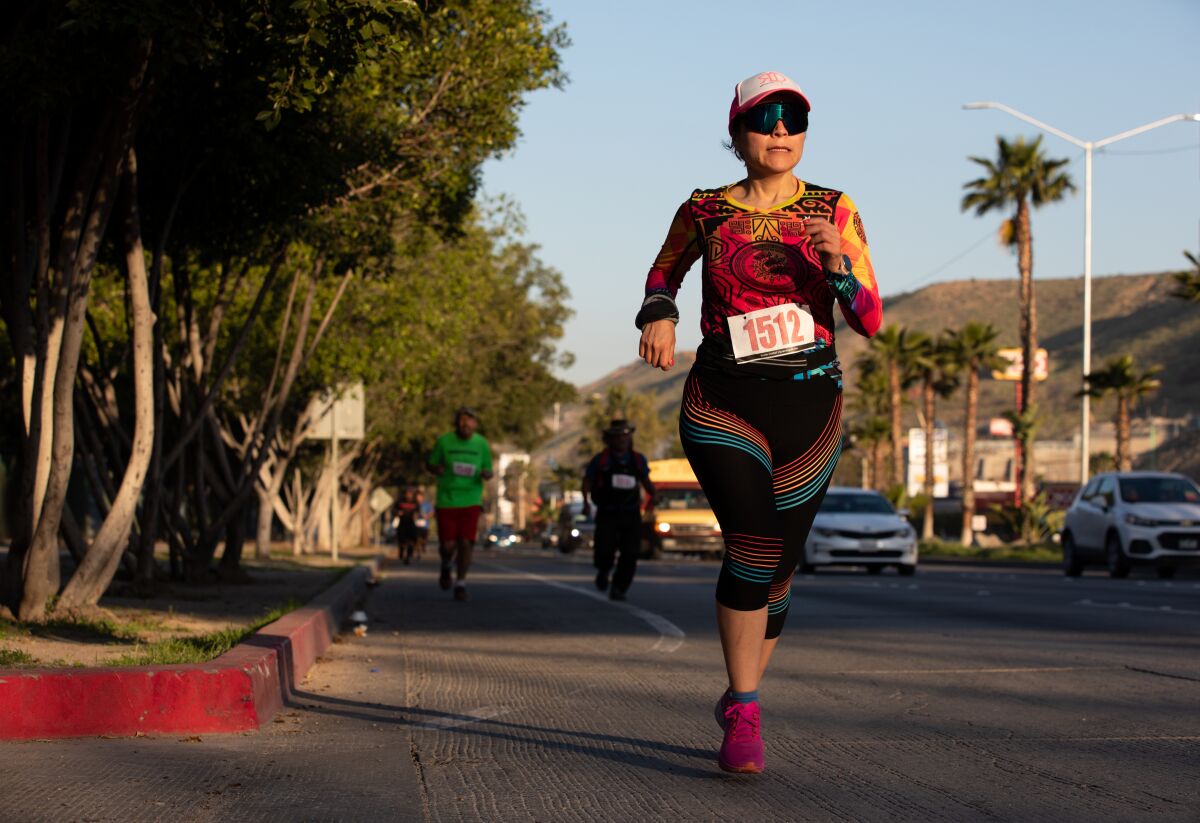 Glor Olono participated in the 5K race. (Ana Ramirez / The San Diego Union-Tribune)
