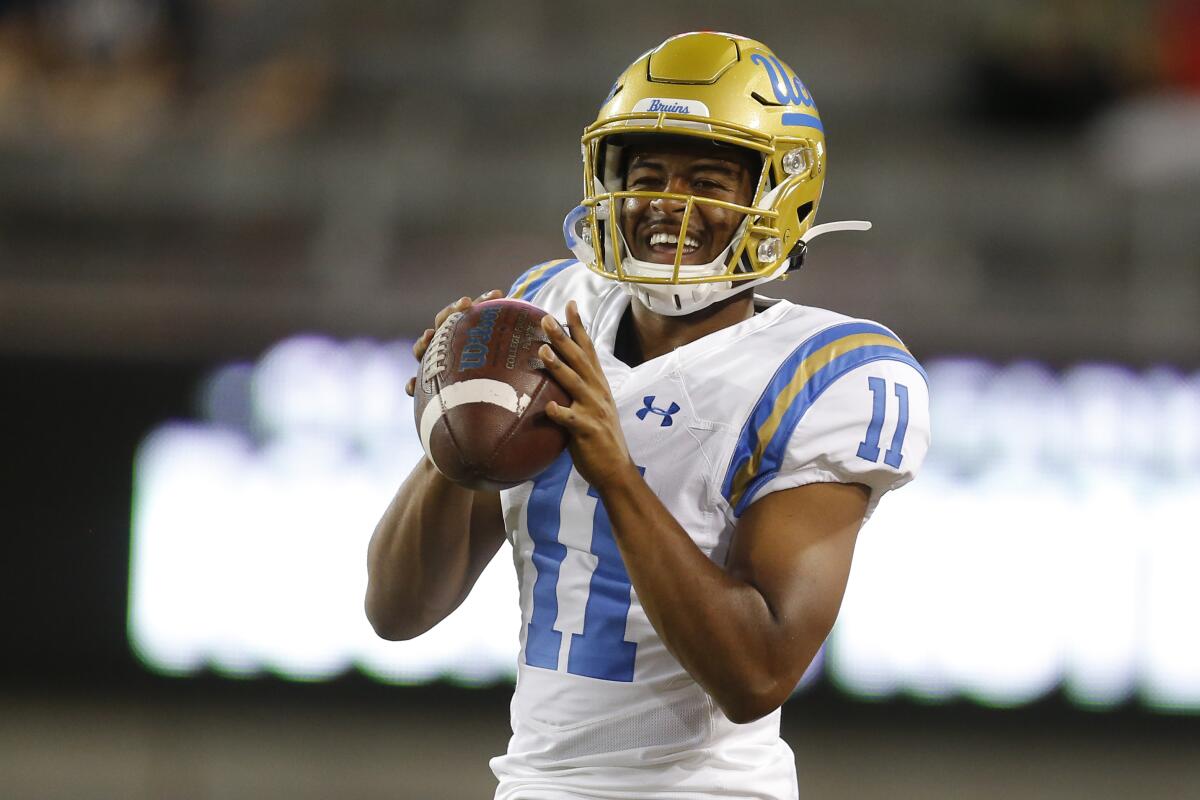 UCLA quarterback Chase Griffin smiles during an NCAA college football game against Arizona.