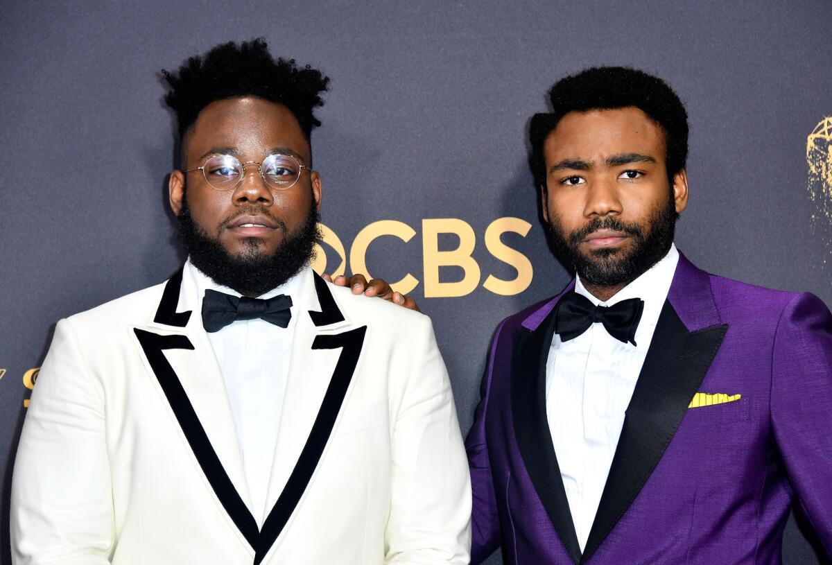 Writer Stephen Glover, left, and actor Donald Glover, right, of "Atlanta" attend the 69th Primetime Emmy Awards at Microsoft Theater on Sept. 17, 2017.