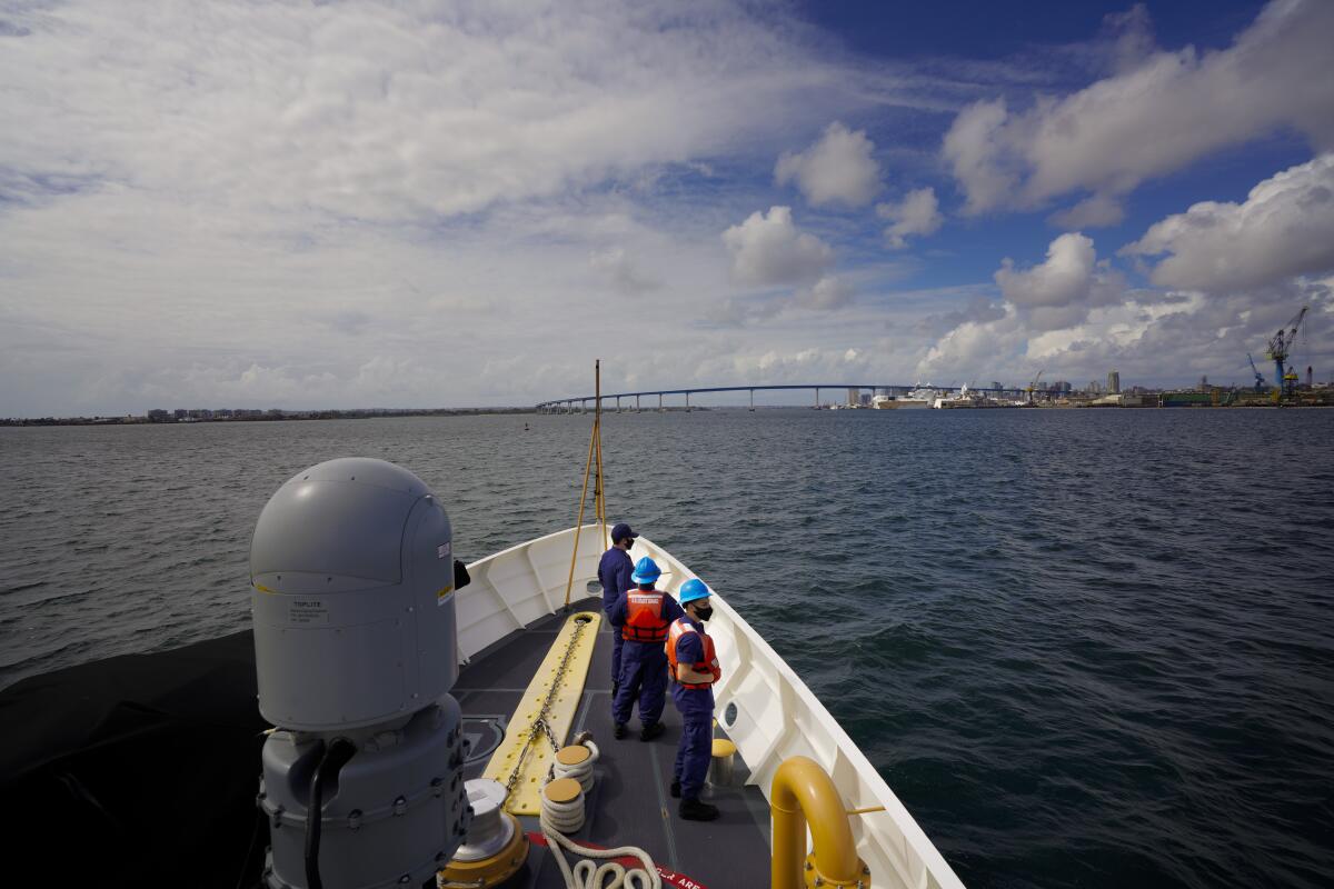 On the San Diego Bay on Wednesday, March 10, 2021 in San Diego, CA., crew members from the USCGC Forrest Rednour stand watch.