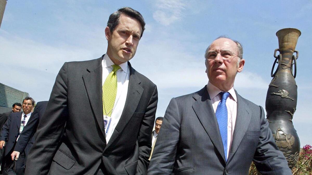 Randal Quarles, left, in Lima, Peru, in 2004 while serving as the U.S. Treasury's assistant secretary for international affairs.