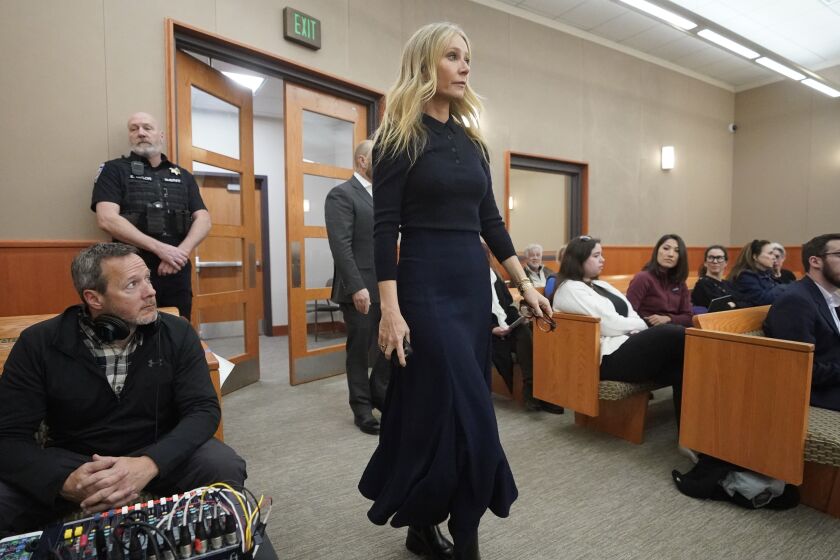 Gwyneth Paltrow enters the courtroom for her trial, Friday, March 24, 2023, in Park City, Utah, where she is accused in a lawsuit of crashing into a skier during a 2016 family ski vacation, leaving him with brain damage and four broken ribs. (AP Photo/Rick Bowmer, Pool)