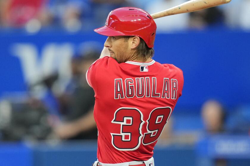 TORONTO, ON - AUGUST 26: Ryan Aguilar #39 of the Los Angeles Angels swings against the Toronto Blue Jays.