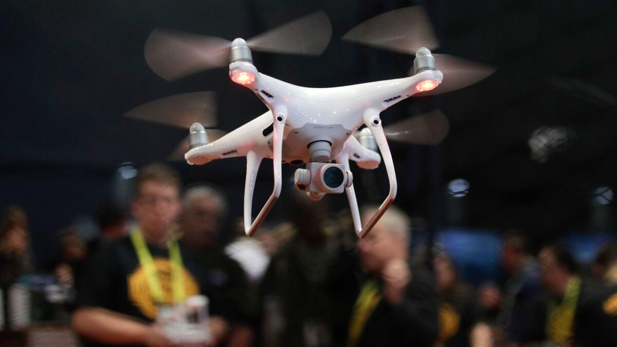A drone in flight at CES International in Las Vegas in January. President Trump signed a memorandum Wednesday permitting states, localities and native tribes to set up their own pilot programs to test drones.
