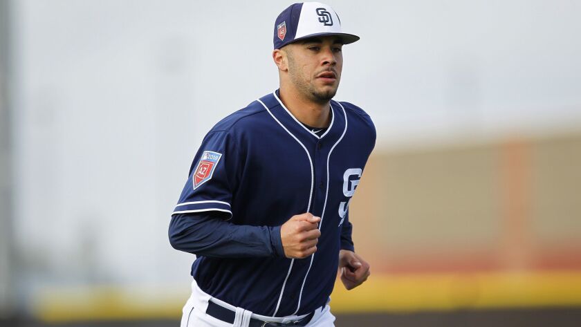 San Diego Padres pitcher Joey Lucchesi runs during a spring training practice in Peoria on Feb. 19, 2018.