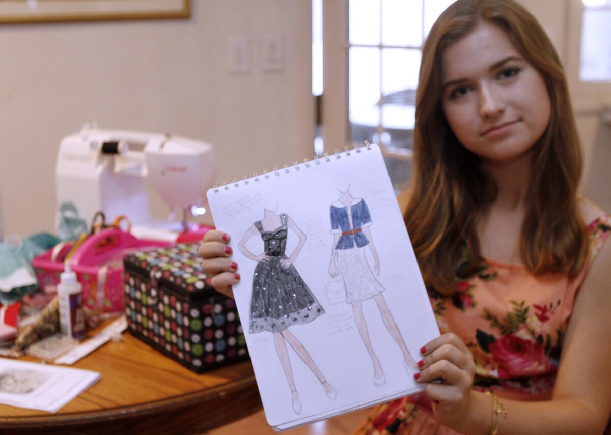 Sixteen year-old Grace Rickert shows some of the designs she has created, at her home in La Cañada Flintridge on Friday, Oct. 24, 2014. Rickert recently participated in the Lifetime TV show Project Runway: Threads.