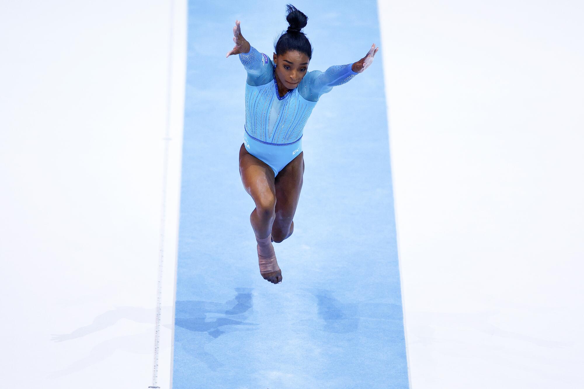 Simone Biles competes in the vault during the women's qualifying session in Belgium in 2023.