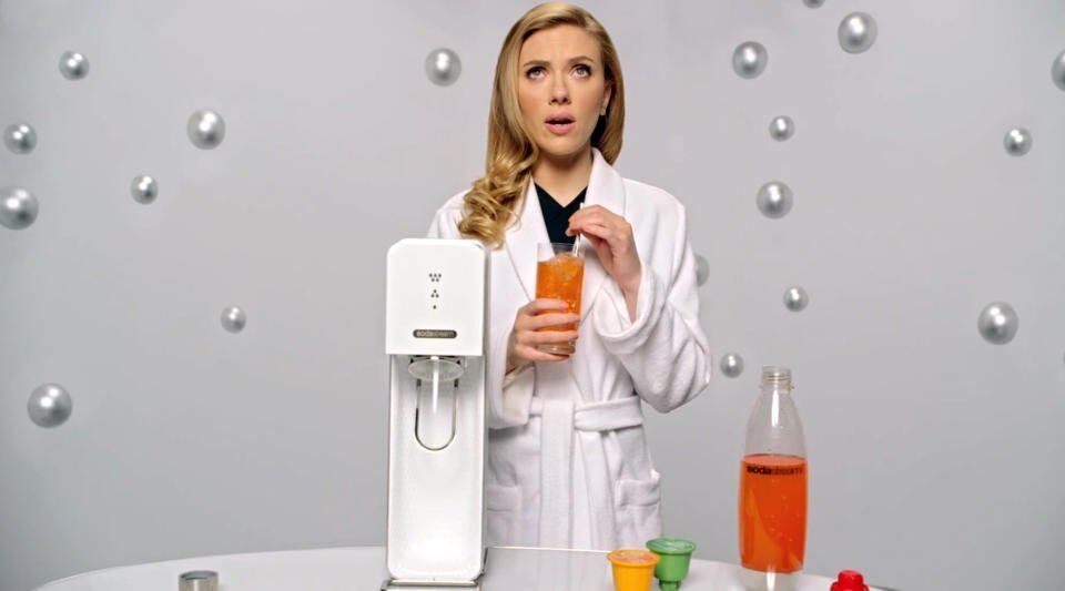 This undated frame grab provided by SodaStream, shows the company's 2014 Super Bowl commercial. SodaStream’s ad features “Her” actress Scarlett Johansson promoting its at-home soda maker and will run in the fourth quarter.