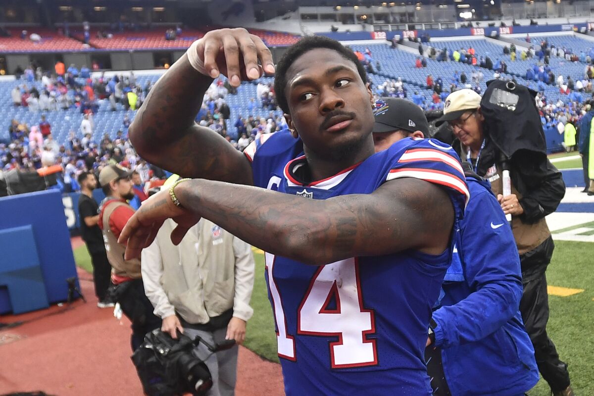 Buffalo Bills wide receiver Stefon Diggs celebrates after the Bills defeated the Houston Texans 40-0 in an NFL football game, Sunday, Oct. 3, 2021, in Orchard Park, N.Y. (AP Photo/Adrian Kraus)