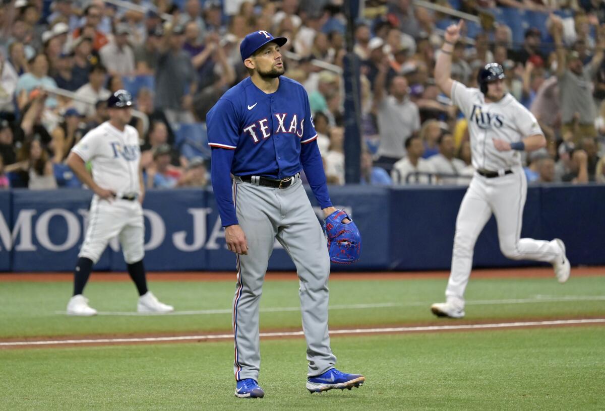 McClanahan becomes majors' 1st 10-game winner, Rays beat Rangers 7