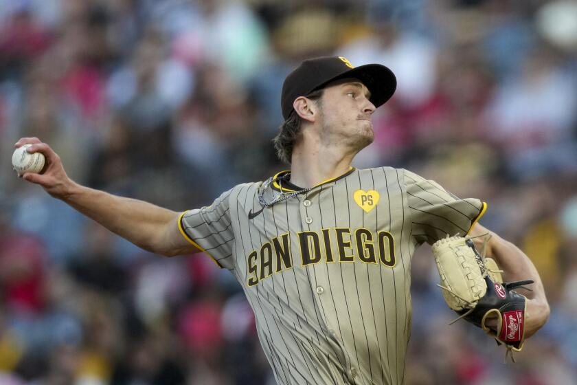 San Diego Padres starting pitcher Adam Mazur throws to a Los Angeles Angels batter during the first inning of a baseball game in Anaheim, Calif., Tuesday, June 4, 2024. (AP Photo/Eric Thayer)
