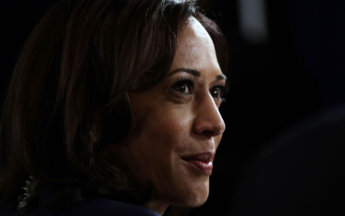 FILE - In this Sept. 12, 2019, file photo Sen. Kamala Harris, D-Calif., talks to the media in the spin room following the Democratic presidential primary debate hosted by ABC on the campus of Texas Southern University in Houston. (AP Photo/Eric Gay, File)