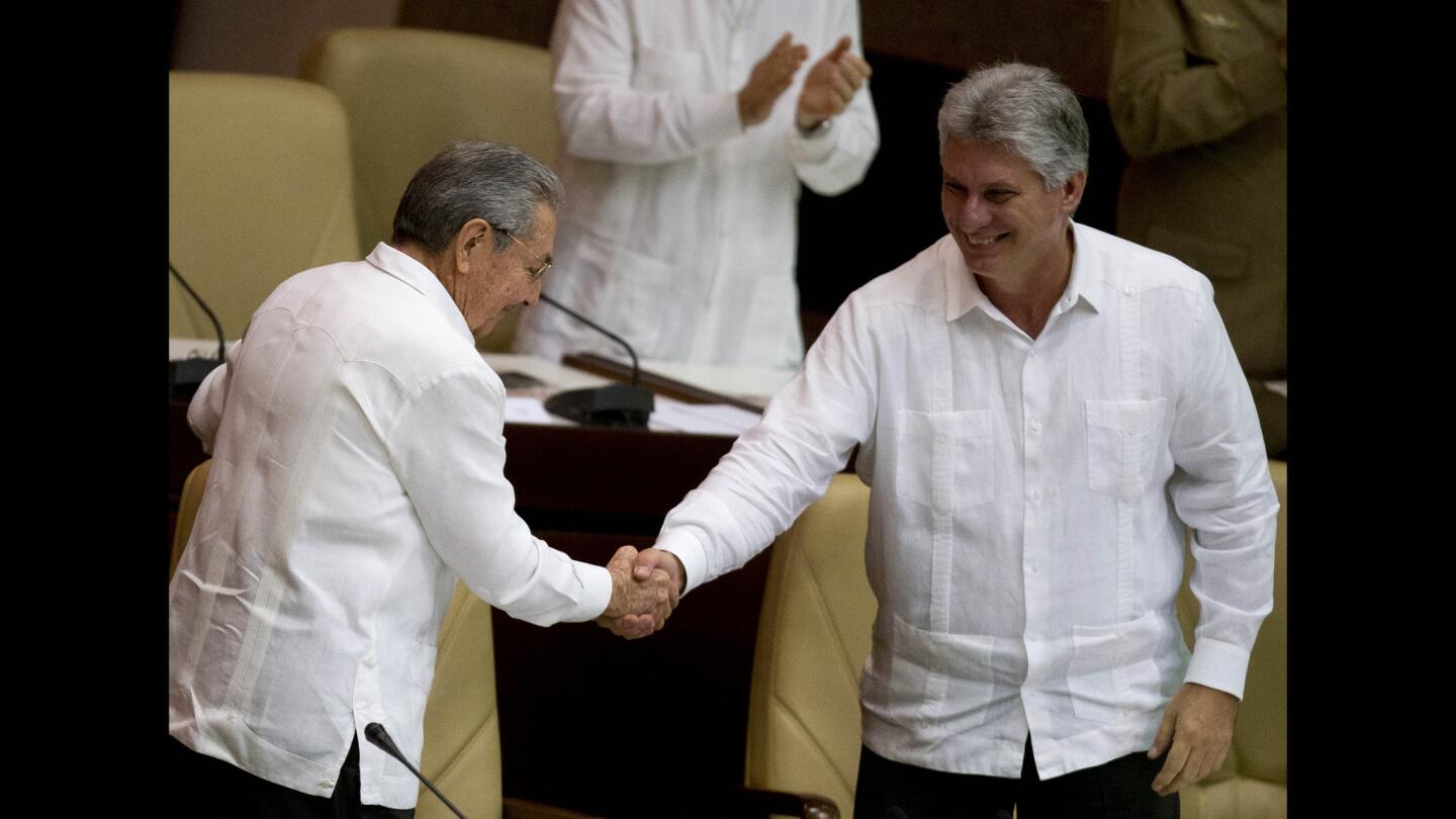 Raul Castro and Miguel Diaz-Canel