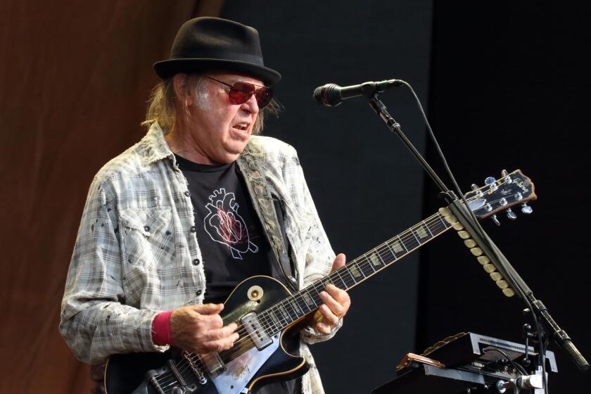  2019/07/12: Neil Young performs on stage at London's Hyde Park. 