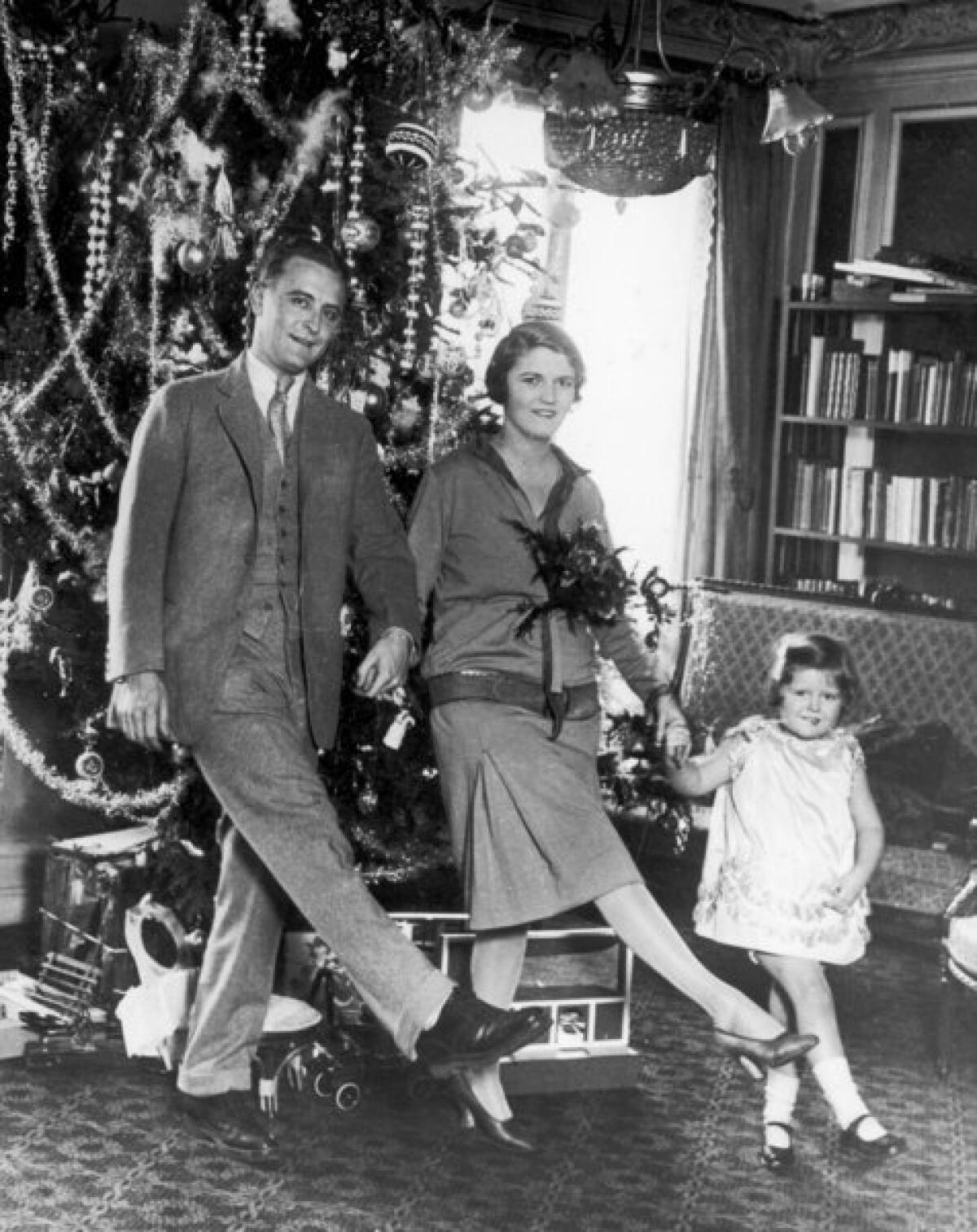 F. Scott Fitzgerald, his wife, Zelda, and daughter, Frances (a.k.a. Scottie), celebrate Christmas 1925 in Paris.