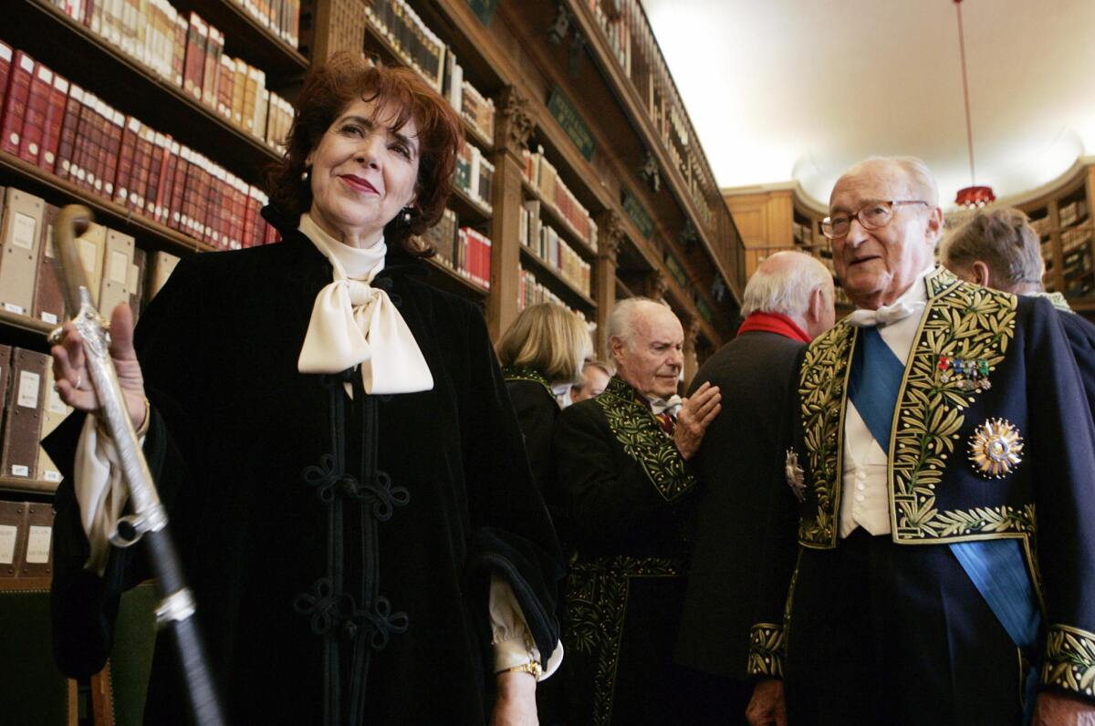 Assia Djebar, at left, was the first Algerian to be inducted into France's prestigious Academie Francaise. The writer and filmmaker has died at the age of 78.