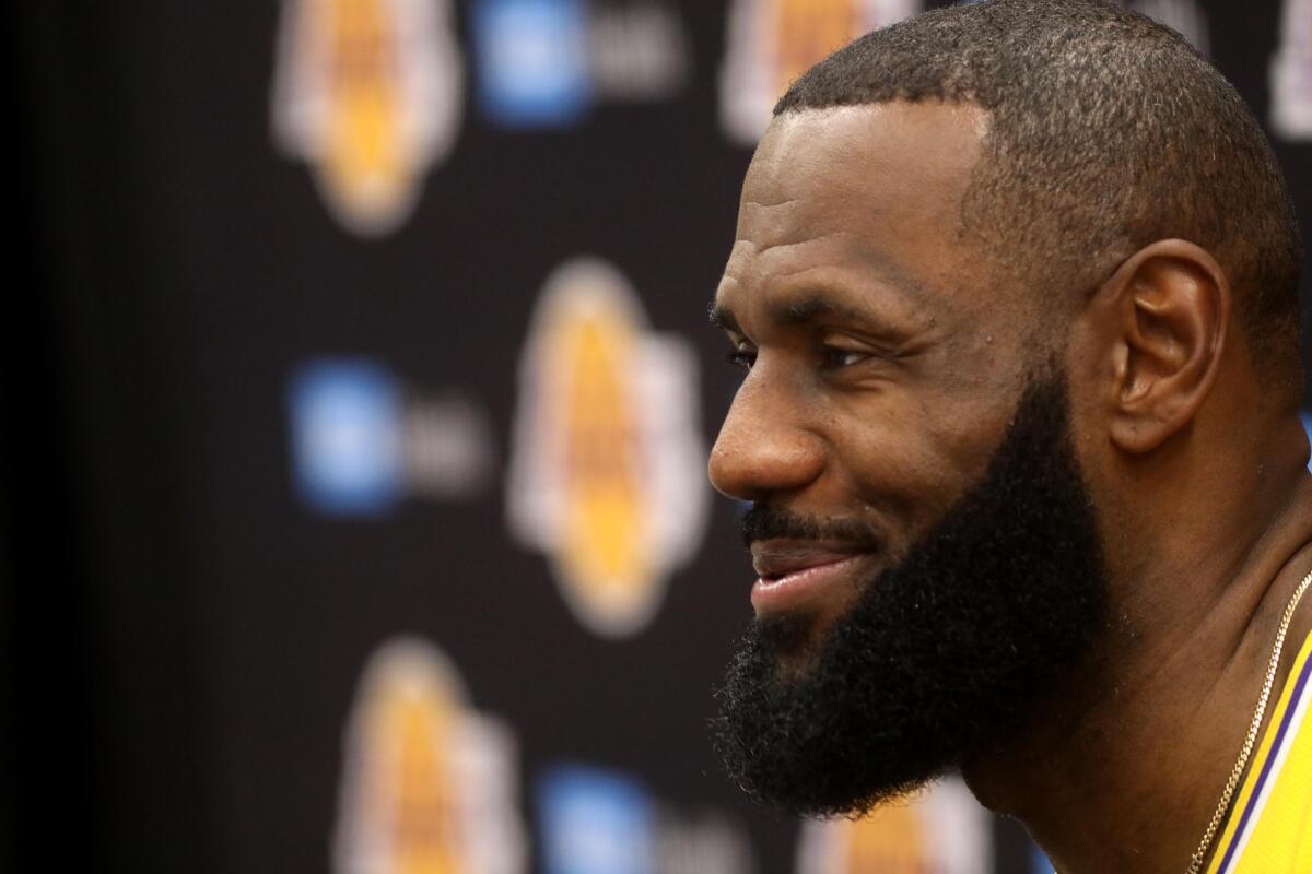 Lakers star LeBron James answers questions during his media-day session with reporters.