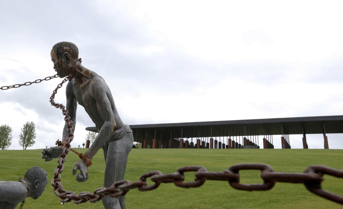 A statue of a person in chains