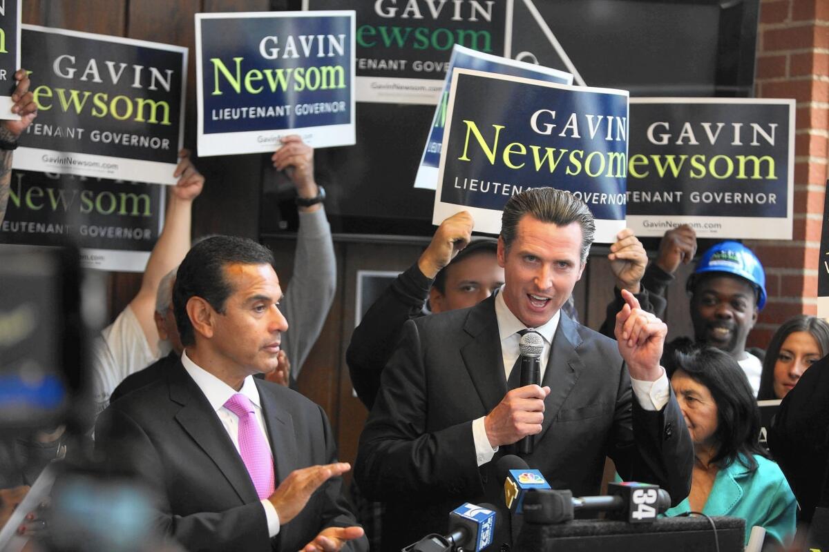 Gavin Newsom campaigning for lieutenant governor in 2010; then-L.A. Mayor Antonio Villaraigosa is at left. Newsom has declared his bid to succeed Gov. Jerry Brown and Villaraigosa is expected to do likewise.