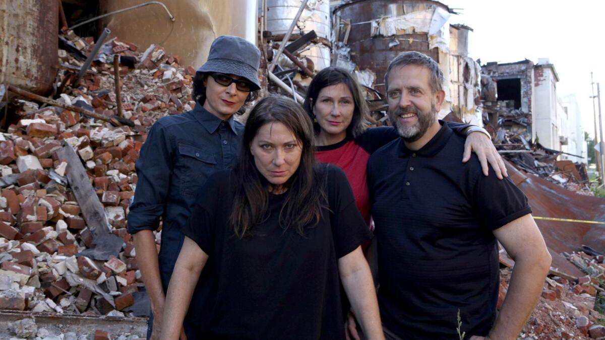Kim Deal, front, with, from left, Josephine Wiggs, Kelley Deal and Jim Macpherson.