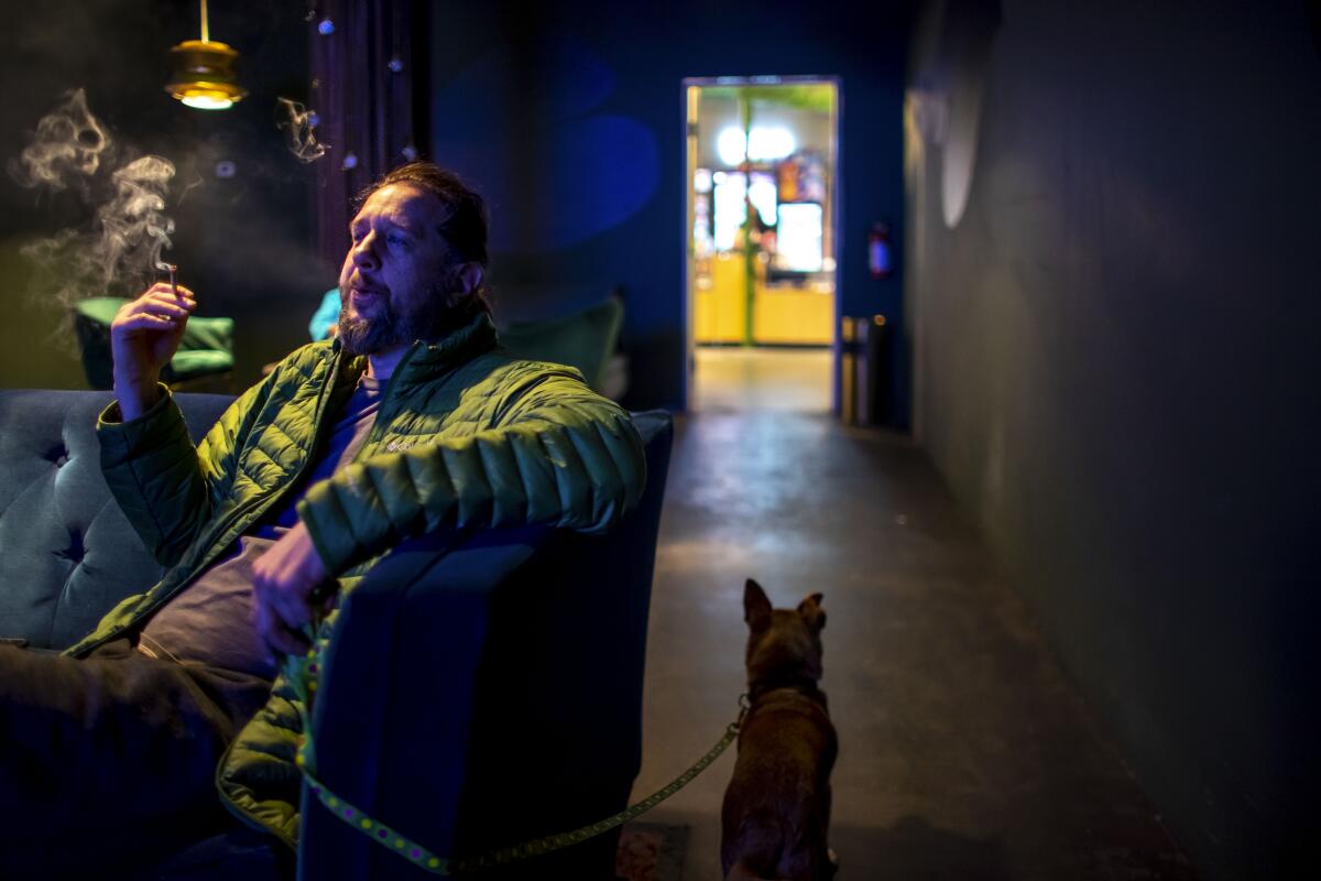 Shannon Graham smokes marijuana with his dog