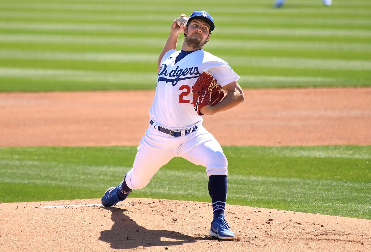 Dodgers pitcher Trevor Bauer throws a pitch against the Colorado Rockies.