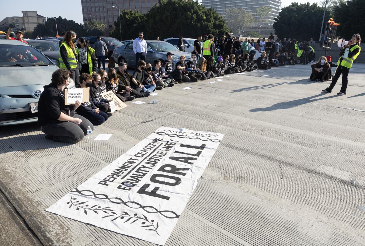 Protesters block the 110 freeway in downtown Los Angeles