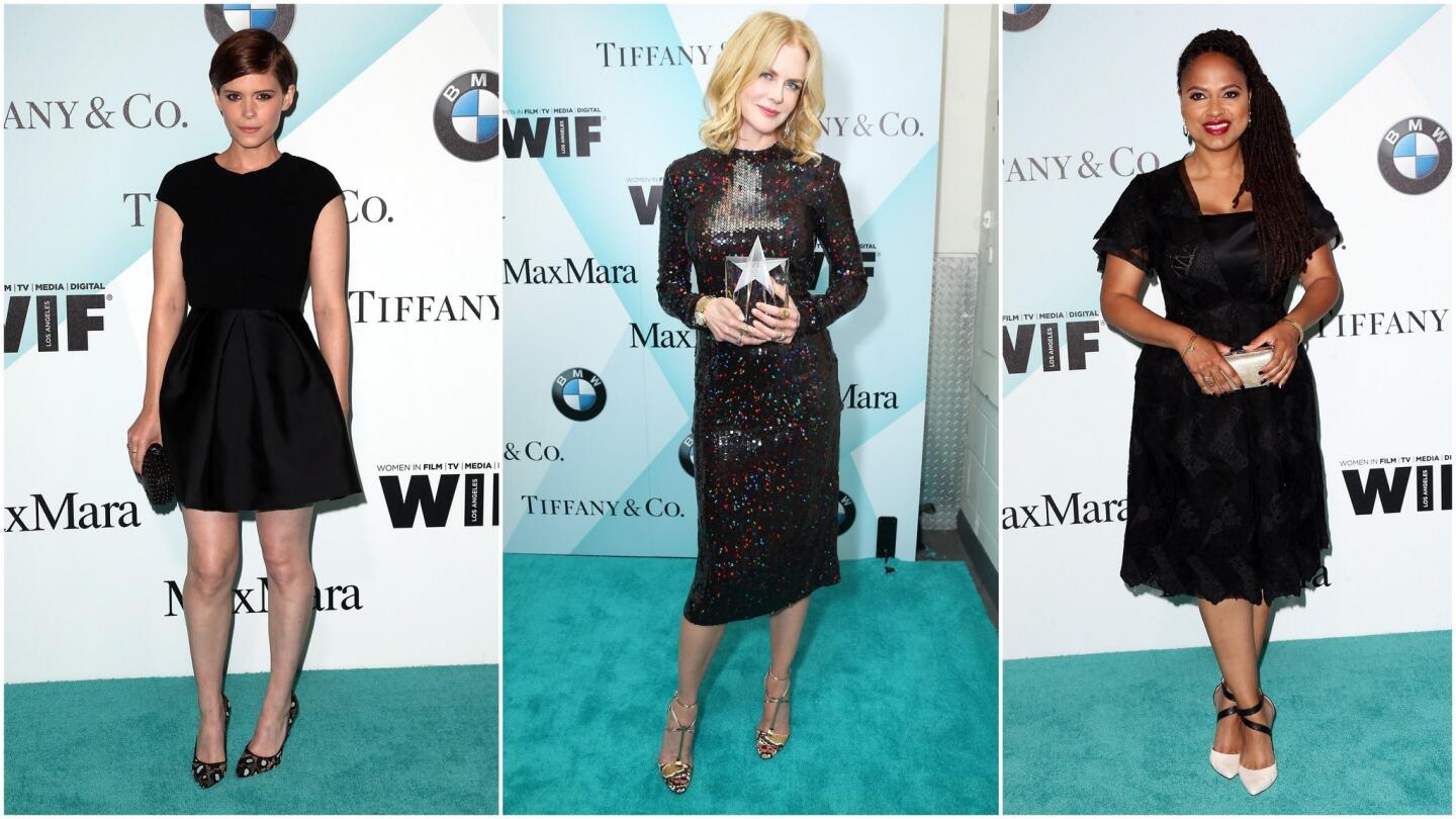 From left: Kate Mara in a Max Mara silk cocktail dress; Nicole Kidman wearing a Nina Ricci brown-sequined top with a brown sequined skirt; Ava Duvernay in a Max Mara lace cocktail dress.