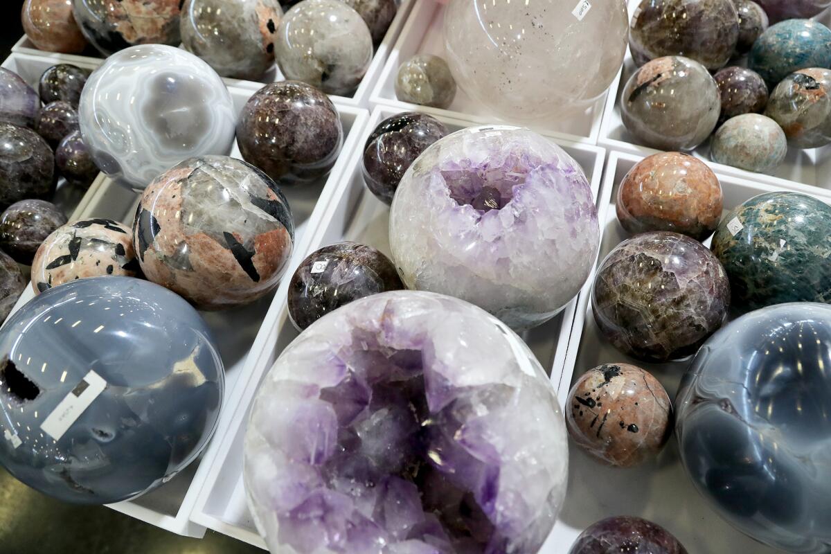 Crystal spheres by Elegant Healing were up for sale Friday during the Gem Faire at the O.C. fairgrounds in Costa Mesa. 