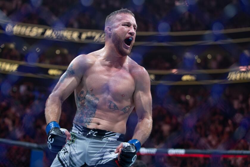 SALT LAKE CITY, UT - JULY 29: Justin Gaethje celebrates beating Dustin Poirier during their BMF Title Lightweight.