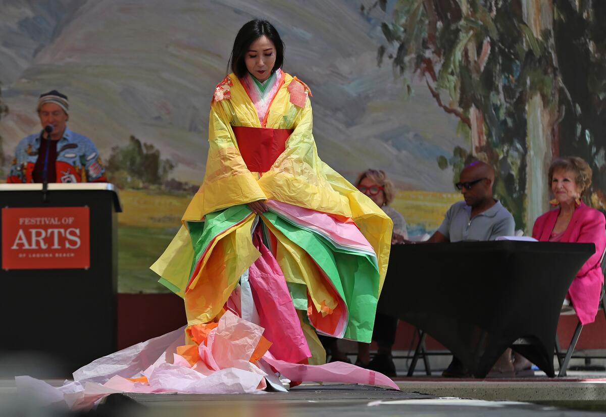 Tomoka Nomura-Jarvis models a traditional Japanese court dress by artist Rowan Foley.